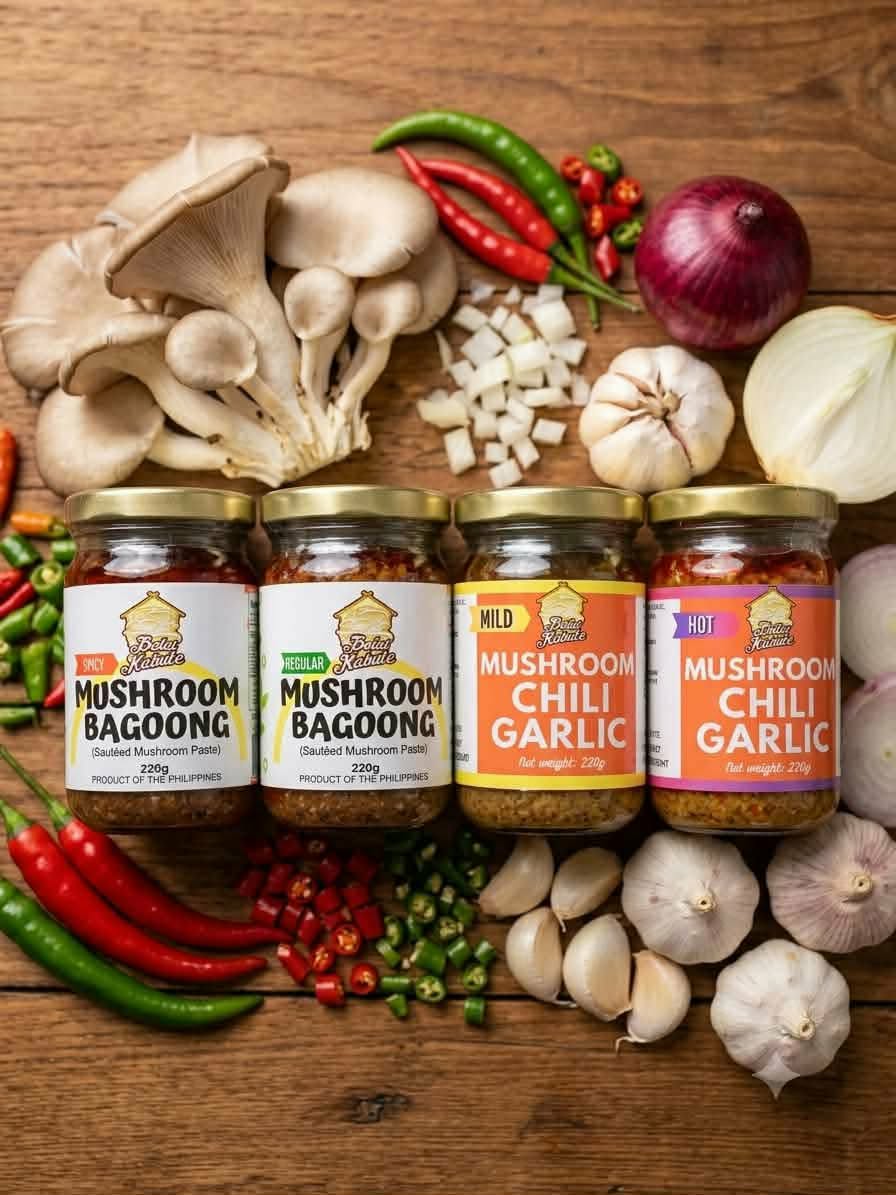 Balai Kabute mushroom bagoong and mushroom chili garlic jars with fresh mushrooms, chilis and garlic